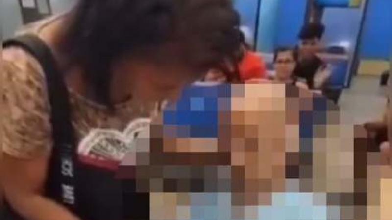 Brasil mujer arrestadas por llevar cadáver a Banco 